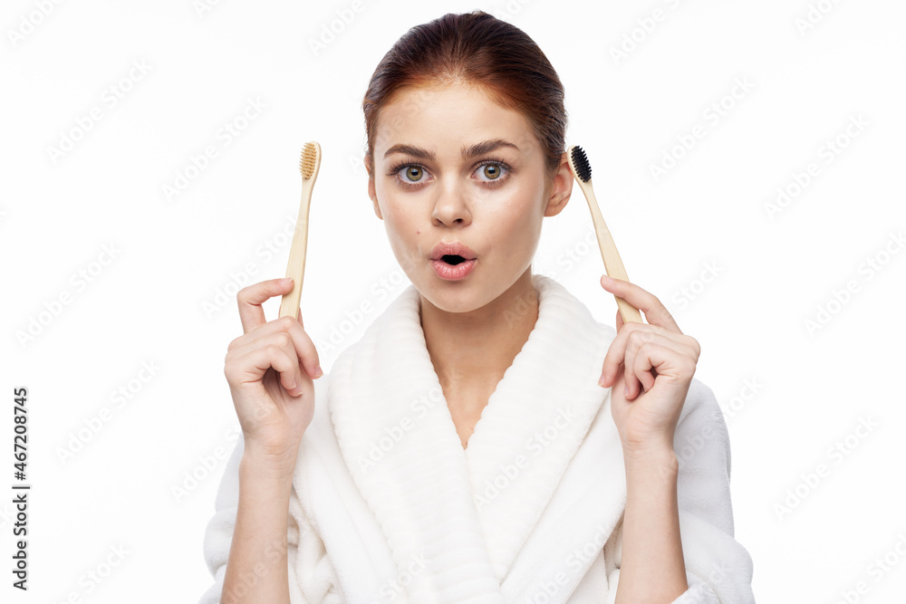 contact woman in white robe toothbrushes bathroom hygiene contact woman in white robe toothbrushes bathroom hygiene