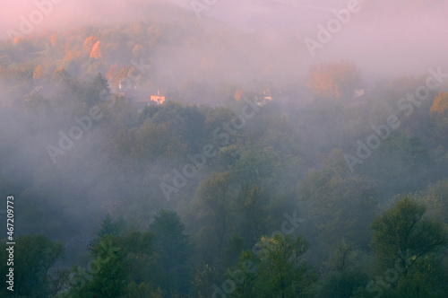 Dense fog in mountain village