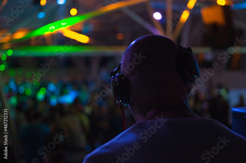 DJ wearing headset in party photo