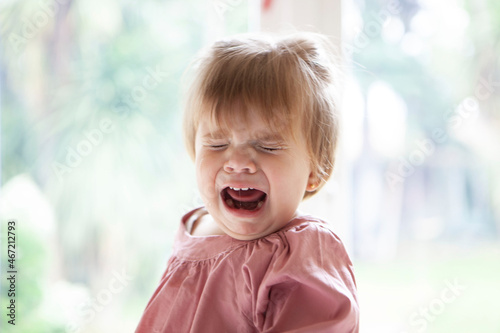 Wallpaper Mural Girl in brown top crying Torontodigital.ca