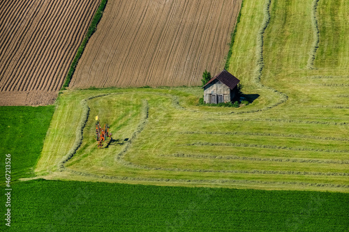 House in the middle of cultivated field photo