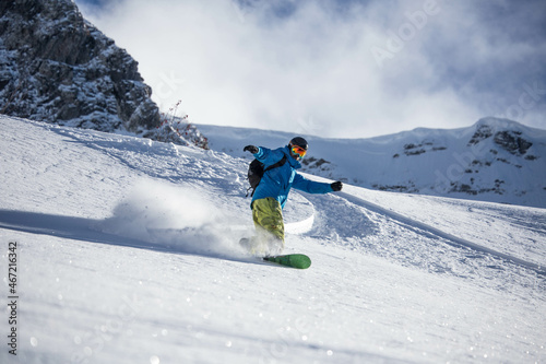 Person snowboarding during daytime photo