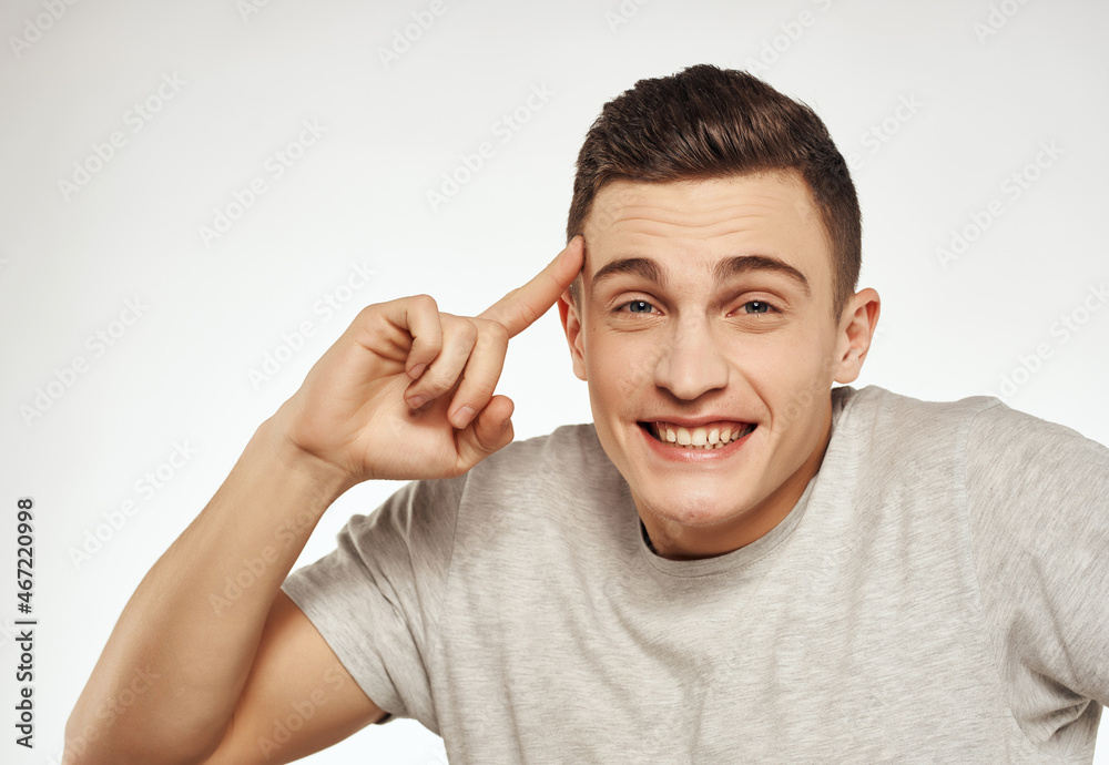 emotional man in white t-shirt hand gestures fun fashion emotional man in white t-shirt hand gestures fun fashion