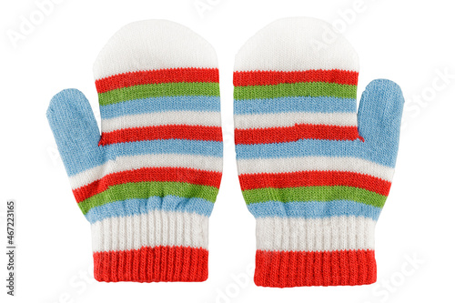 Knitted woolen warm mittens for children, winter clothes, isolated on a white background, close-up
