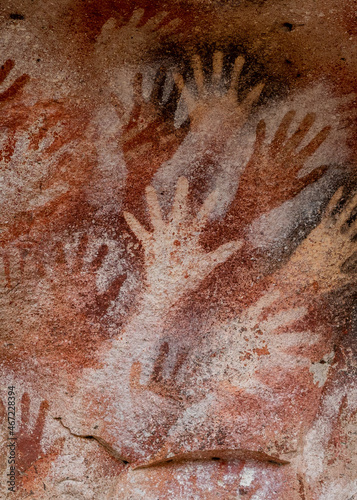 Closeup shot of prehistoric rock art at the Cave of the Hands (Spanish: Cueva de Las Manos ) in Santa Cruz Province, Argentine Patagonia. The art in the cave dates from 13,000 to 9,000 years ago. 