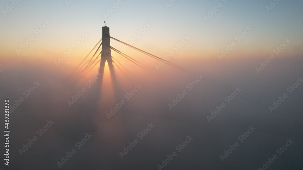 Bridge in the fog on the sunrise Bridge in the fog on the sunrise