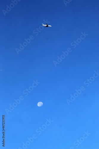 Wallpaper Mural Moon and jetliner both in fall sky Torontodigital.ca