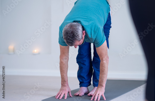 Wallpaper Mural Photo of a yoga instructor, showing the pose to be done. Torontodigital.ca