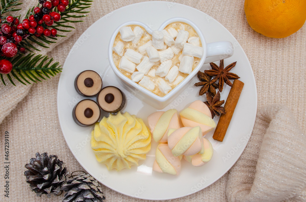 a mug of hot aromatic coffee with marshmallows and various sweets. Festive cozy atmosphere