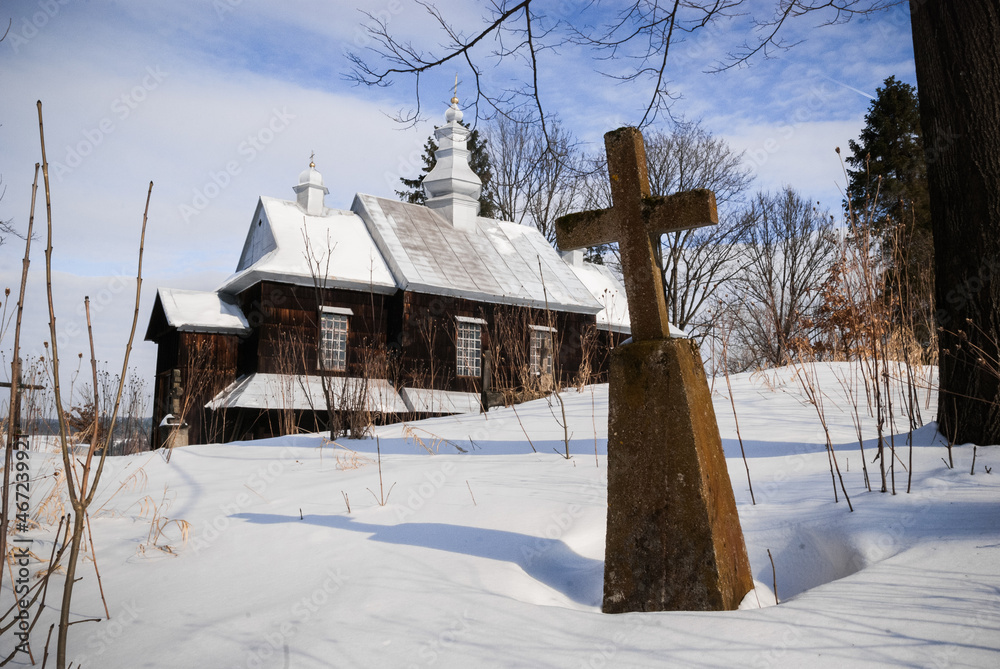 Fototapeta premium Small wooden church in a remote village somwhere in Easter Europe. 