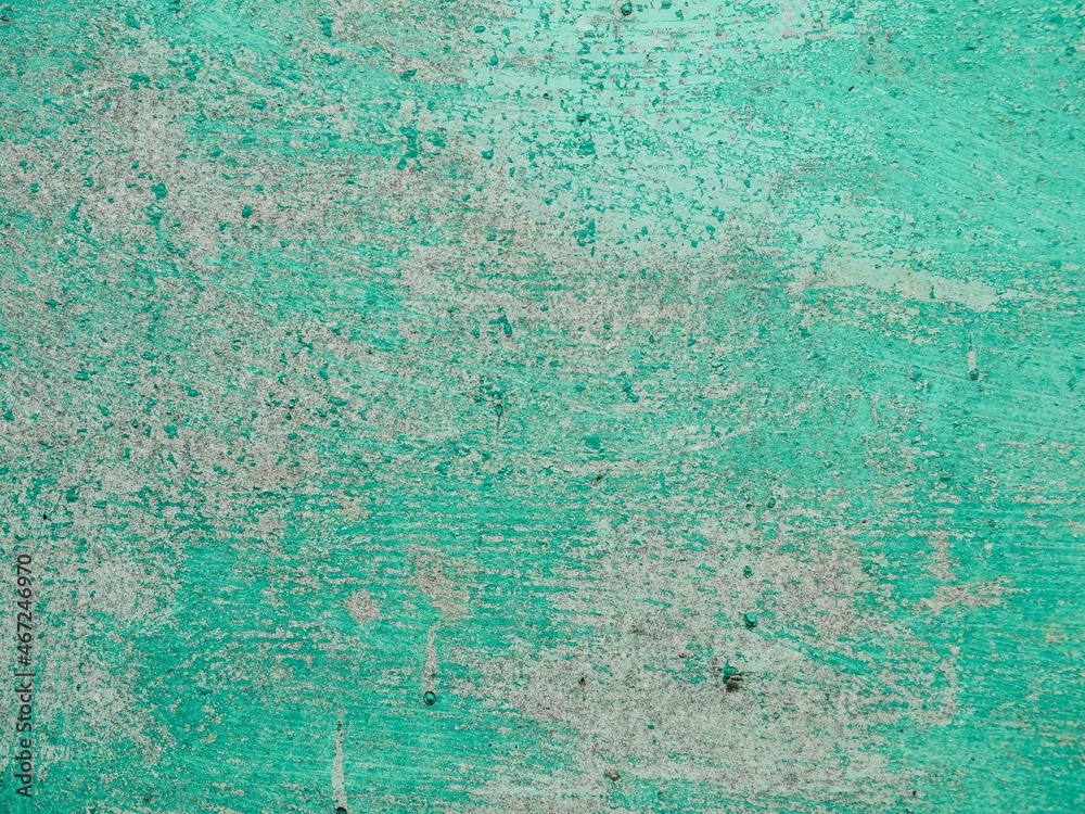 Old vintage green background, painted iron with welding seams