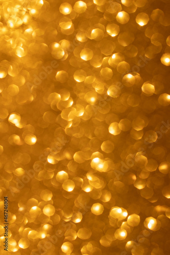 Abstract shiny glitter golden background. Pantone Color 2022 Daffodil