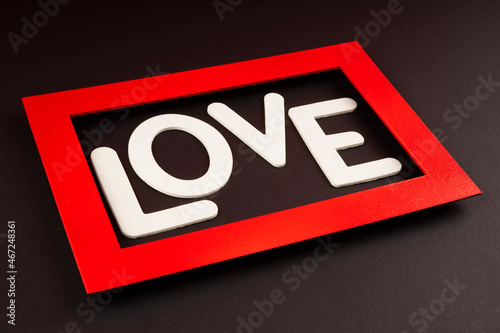 photo of the word love inside a red frame