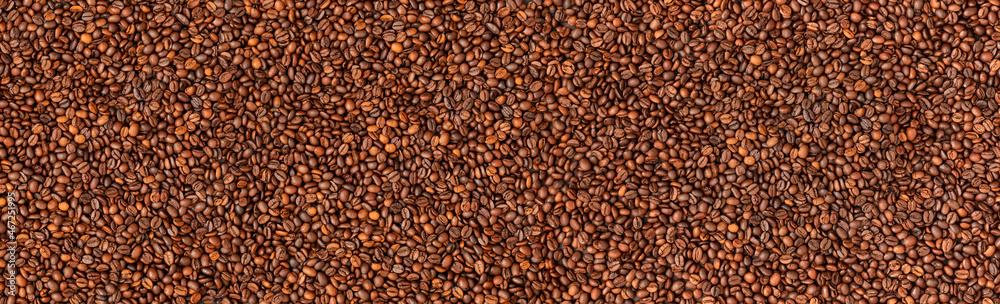 Fresh roasted coffee beans background. Top view. Horizontal banner Fresh roasted coffee beans background. Top view. Horizontal banner