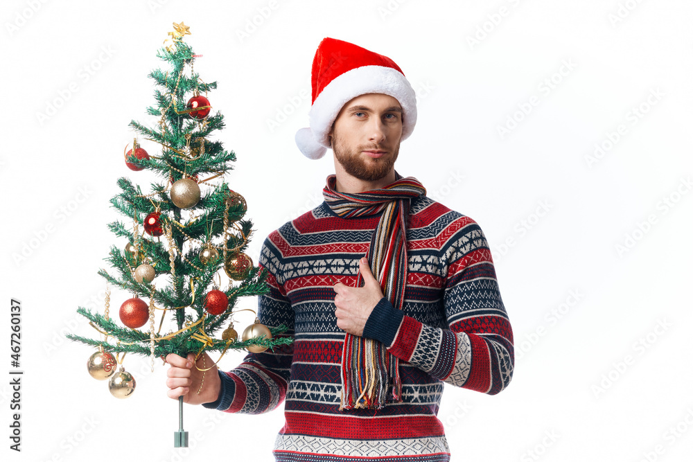 handsome man in New Year's clothes decoration christmas isolated background handsome man in New Year's clothes decoration christmas isolated background