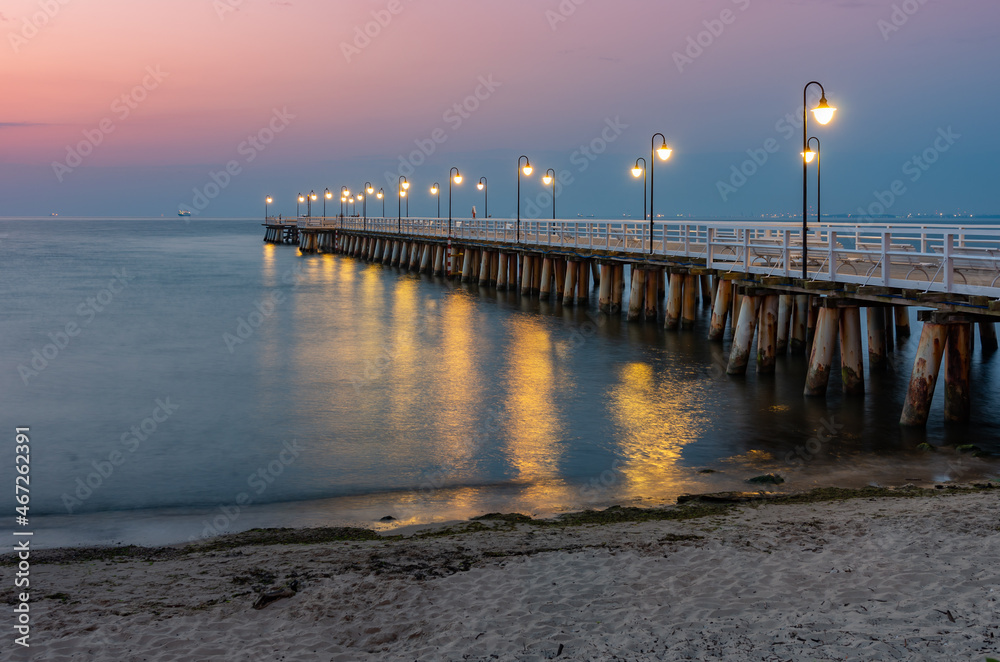 Obraz premium Baltic sea coast, morning view of pier at Gdynia Orlowa sea resort, Poland.