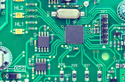 High-tech board with electronic components and microchips close-up