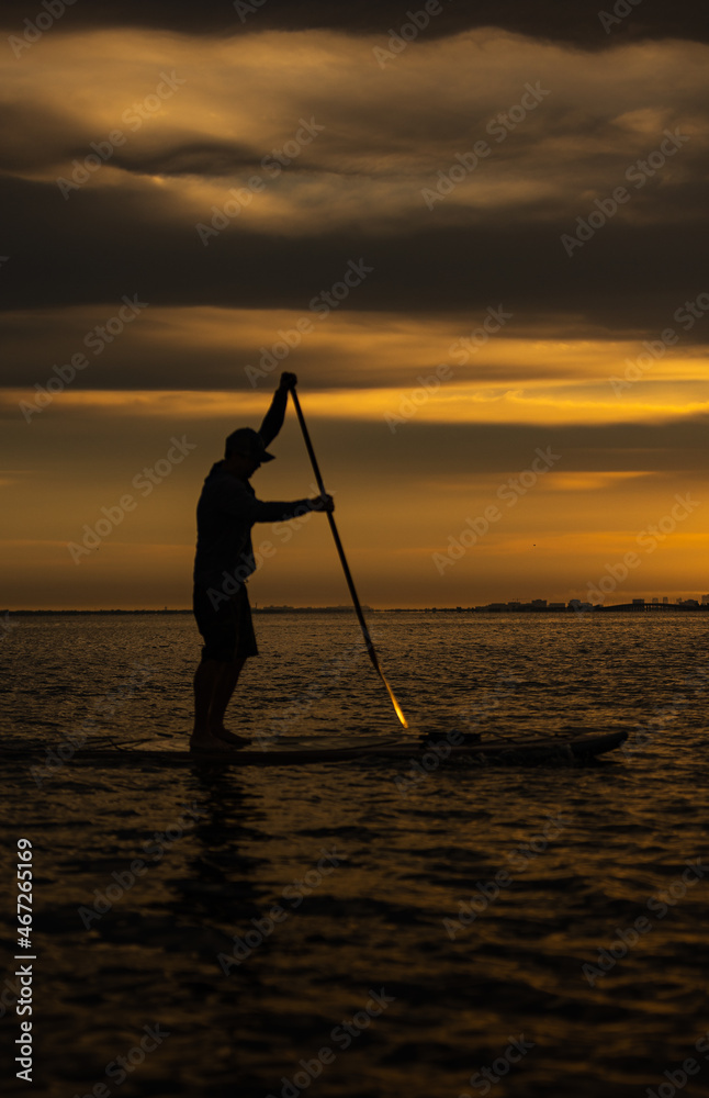 Paddle boarding early morning