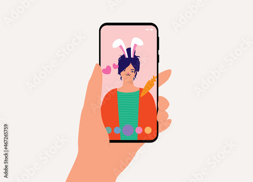 Young Woman Taking AR Selfie With Cute Rabbit Sticker. Augmented Reality Animated Self-Portrait.