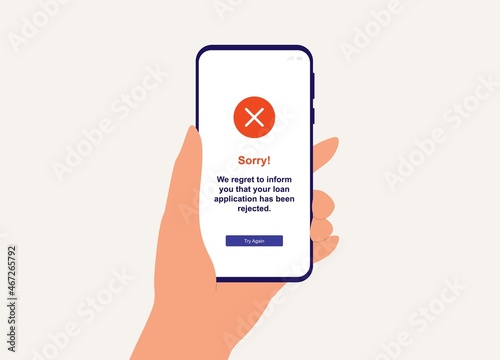 Close-Up View Of Customer's Hand With Mobile Phone Receiving Loan Application Rejection.