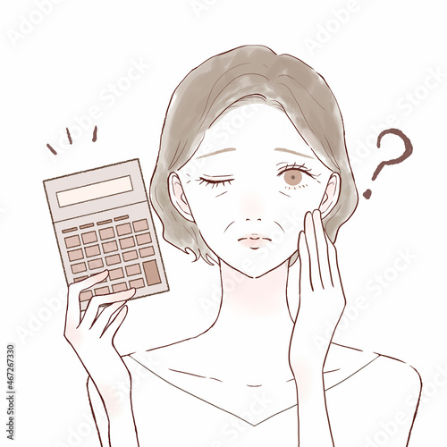 電卓を持った、疑問を持っている中年女性