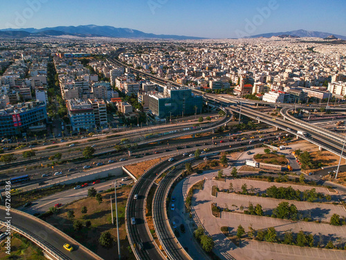 Vehicles elevating one of the most complex roads in Athens, the famous road junction at Faliro, Piraeus. Aerial view over Attica - Greece