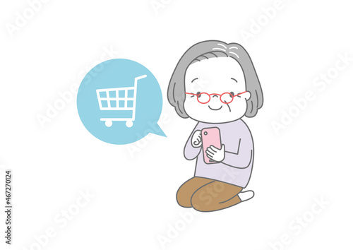 スマートフォンでネットショッピングを楽しむおばあさん