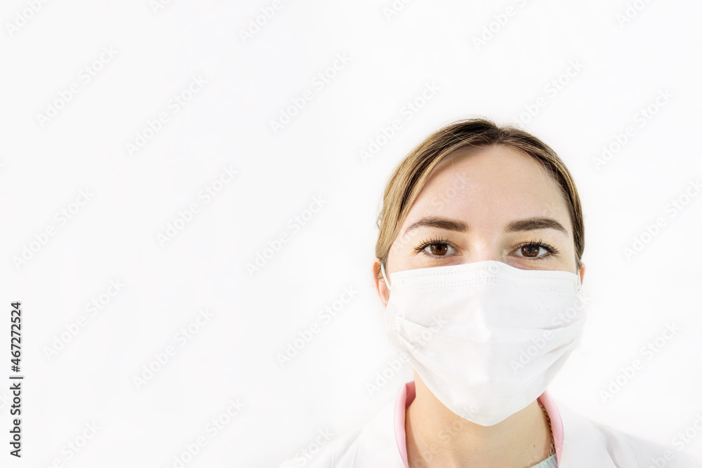 portrait of woman in medical mask and white coat isolate on white background. Close-up. medicine, profession and healthcare concept of young European female doctor or scientist in protective mask on
portrait of woman in medical mask and white coat isolate on white background. Close-up. medicine, profession and healthcare concept of young European female doctor or scientist in protective mask on