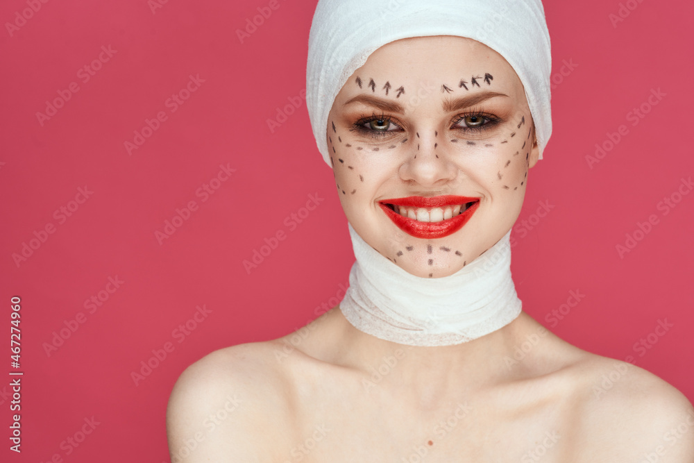 woman Red lips plastic surgery operation bare shoulders close-up woman Red lips plastic surgery operation bare shoulders close-up
