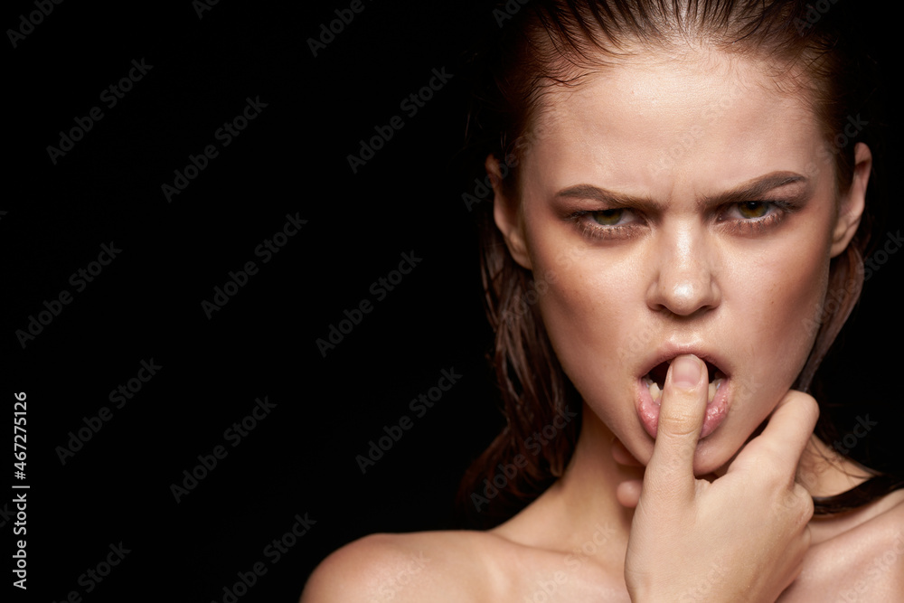 woman model emotions gesture hands bare shoulders dark background woman model emotions gesture hands bare shoulders dark background