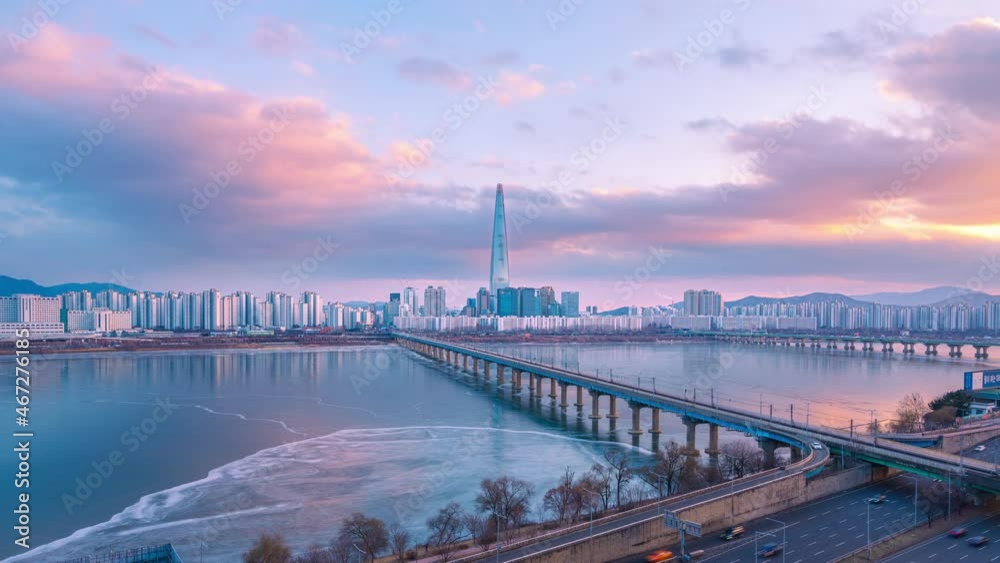 Time lapse ,winter and white snow of South Korea ,Seoul City at namsan mountain. And the sky when the sun sets and the clouds