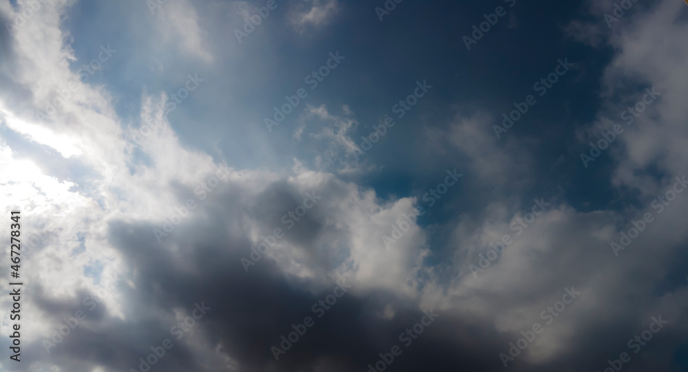blurred blue sky with clouds and sun in Brazil