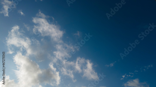 blurred blue sky with clouds and sun in Brazil