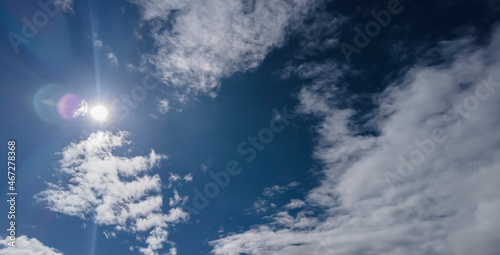 blurred blue sky with clouds and sun in Brazil