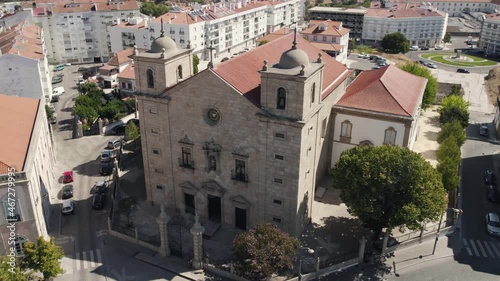 Aerial orbiting São Miguel Church Facade, Downtown Castelo Branco City - Portugal photo