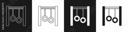 Set Gymnastic rings icon isolated on black and white background. Playground equipment with hanging rope with rings. Vector