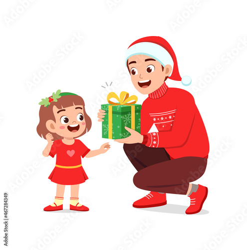 young man give present to little kid