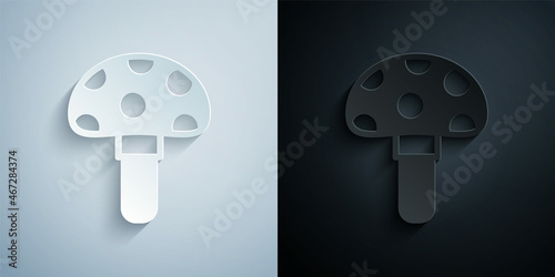 Paper cut Psilocybin mushroom icon isolated on grey and black background. Psychedelic hallucination. Paper art style. Vector