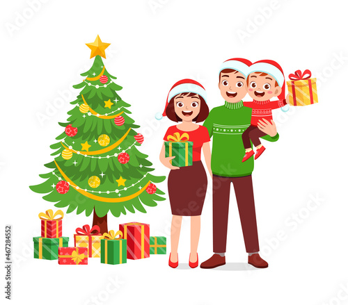 happy mother father and kid celebrate christmas
