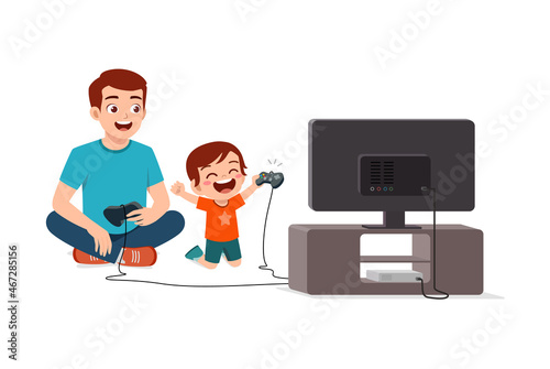 cute little boy play video game on big screen