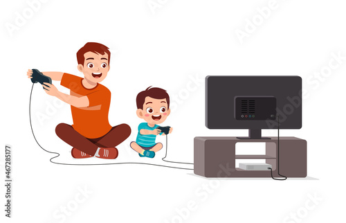 cute little boy play video game on big screen