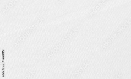 Blurred white fabric texture full frame for background, blurry white abstraction. © pla