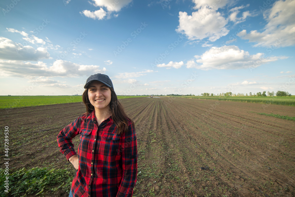 Portrait of young woman in country field Portrait of young woman in country field