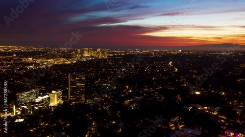 Hyper lapse over the illuminated Beverly Hills cityscape, dusk in Los Angeles, California