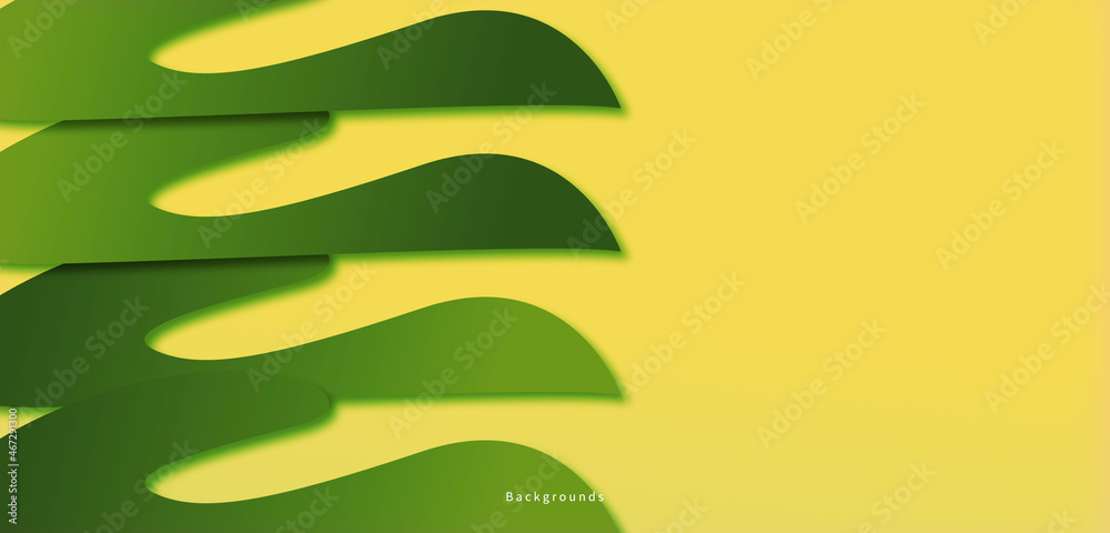 Green abstract shape isolated on a yellow background, looks like a plant in the afternoon. Green abstract shape isolated on a yellow background, looks like a plant in the afternoon.
