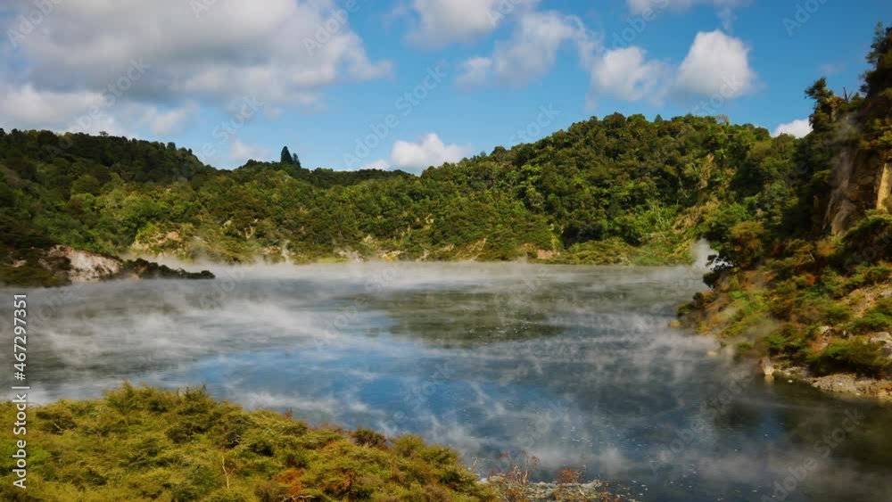 Mystic steam hovering over surface of Frying Pan Lake the largest hot spring in the world, Waimangu Volcanic Rift Valley, North Island, New Zealand Mystic steam hovering over surface of Frying Pan Lake the largest hot spring in the world, Waimangu Volcanic Rift Valley, North Island, New Zealand