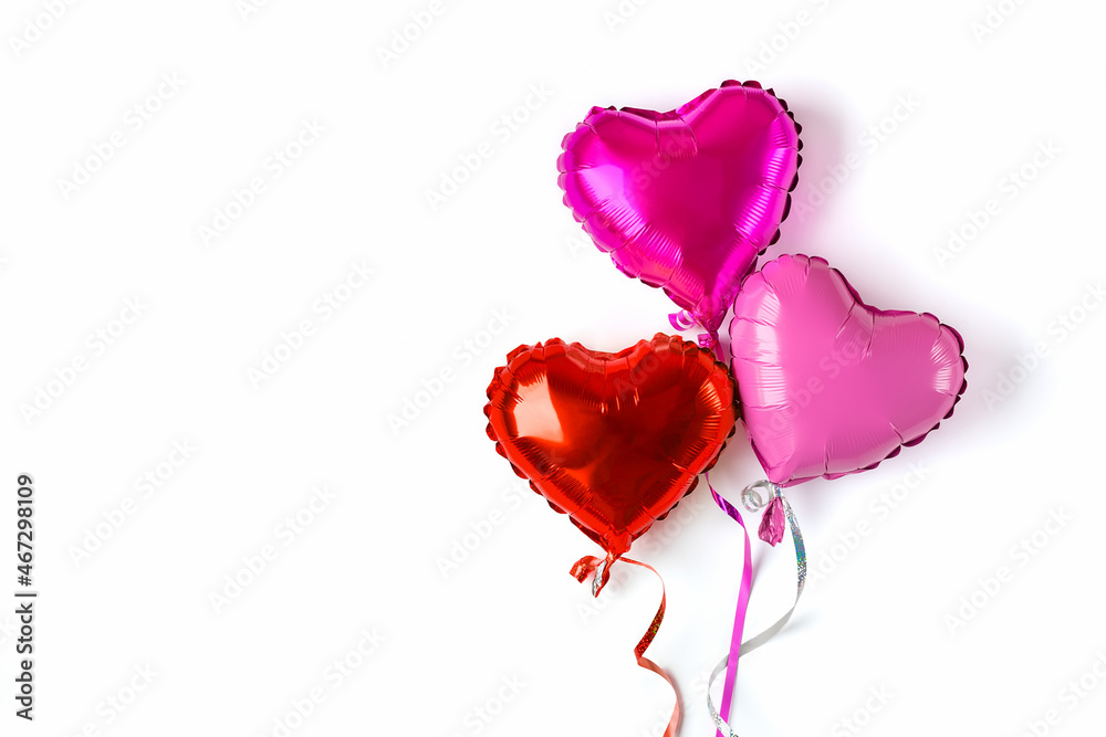 set of three inflatable heart in red, purple, matte pink color isolated on white background Flat lay Top view Holiday card Happy Valentine's day, Birthday party concept Love in the air