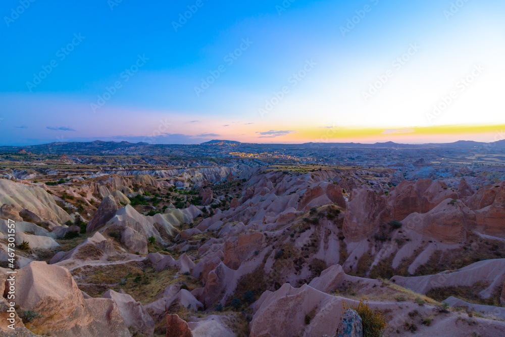 Kizilcukur Valley and Goreme on the background in Cappadocia at Dusk