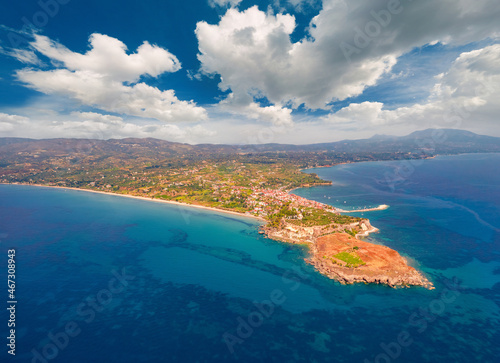 Fototapeta Naklejka Na Ścianę i Meble -  Aerial view of east coast of Ionina sea. Spectacular view from flying drone of Koroni town, Messenia, Peloponnese, Greece, Europe. Traveling concept background.