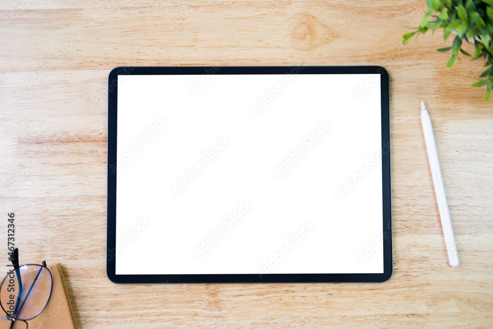 Digital tablet mockup on office working table Digital tablet mockup on office working table